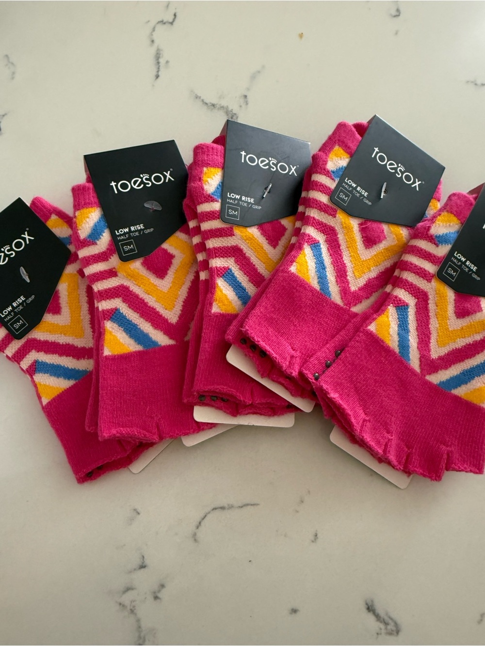toesox Low Rise Chevron Toe Socks in Pink, Yellow, Blue & White